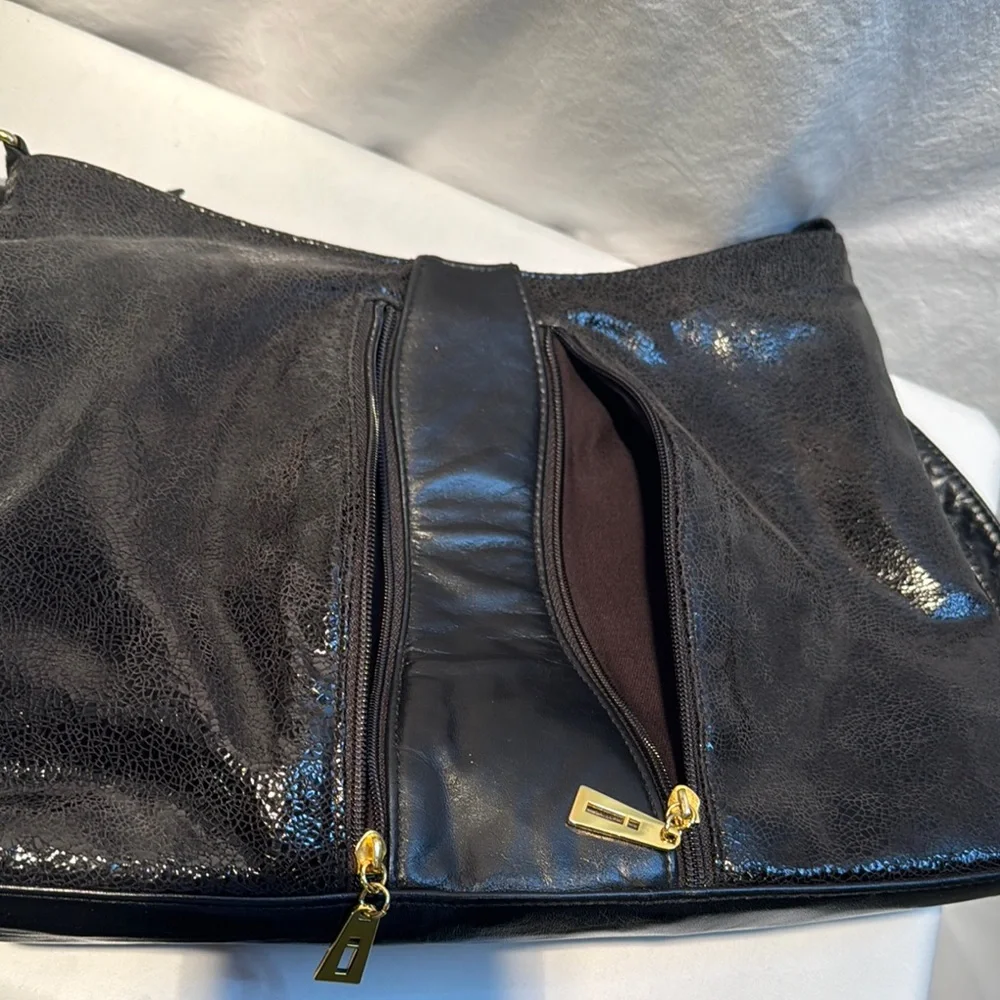 Genuine leather Women Sleek Black Crossbody Bag with Structured Desig